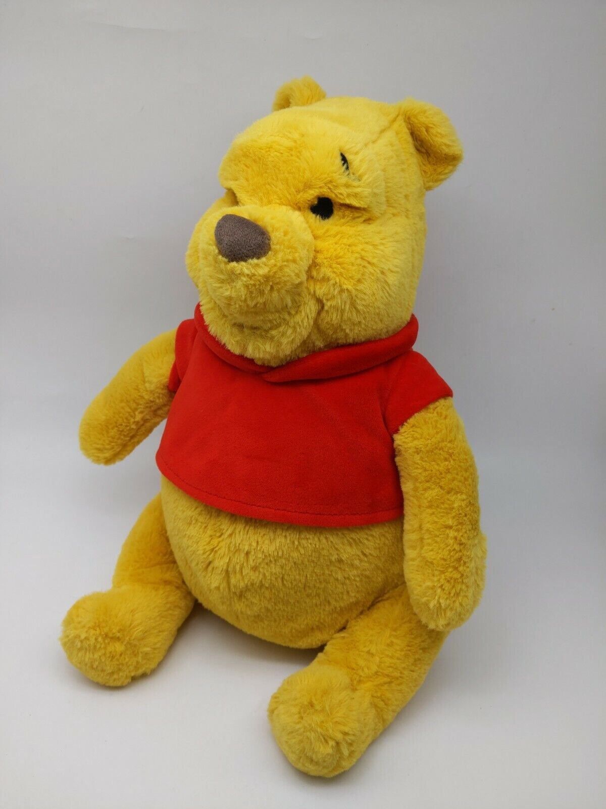 Winnie The Pooh Cuddly Toy: Where Imagination Meets Hugs